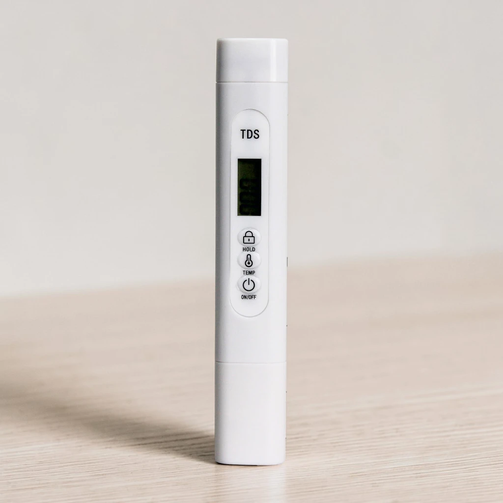 PureAlert Pro digital TDS water quality alarm tester with LCD display HOLD TEMP and ON/OFF buttons white pen design available in Pakistan